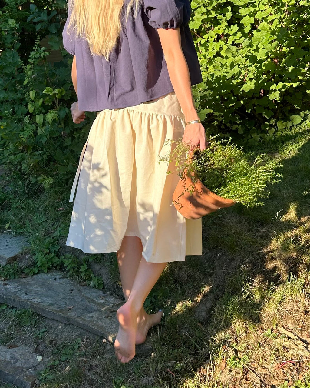 cream two tiered skirt with bows