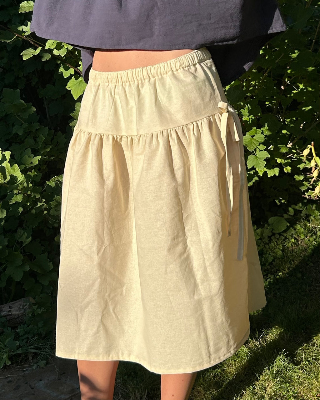 cream two tiered skirt with bows