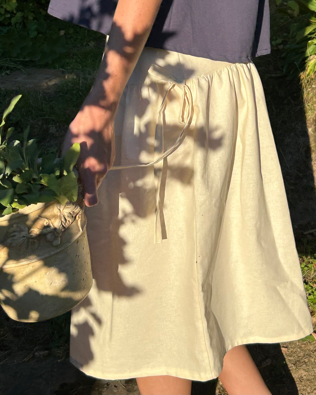 cream two tiered skirt with bows